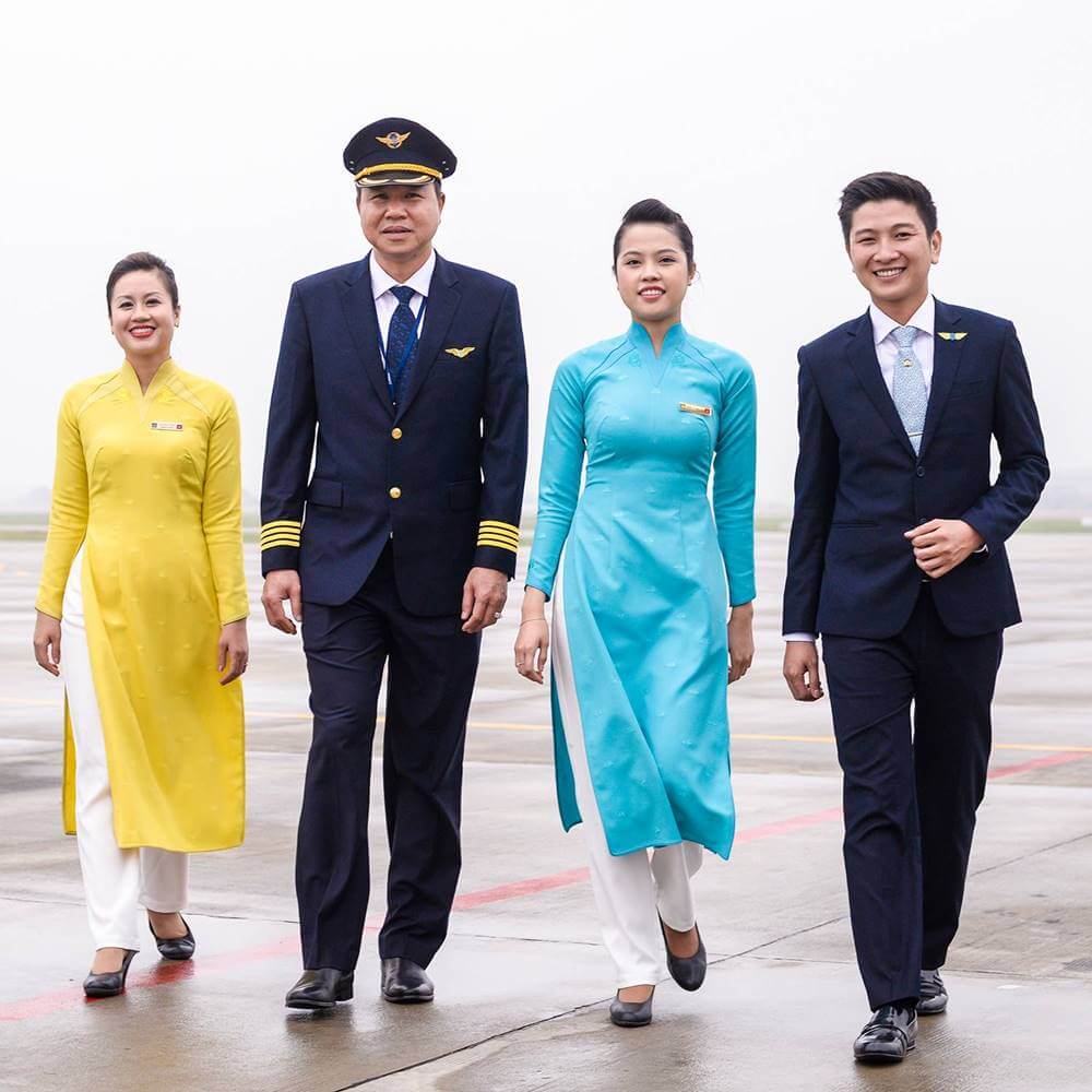 Vietnam Airlines pilots and cabin crew walk