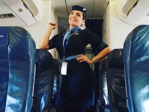 Aerolineas Estelar flight attendant aisle