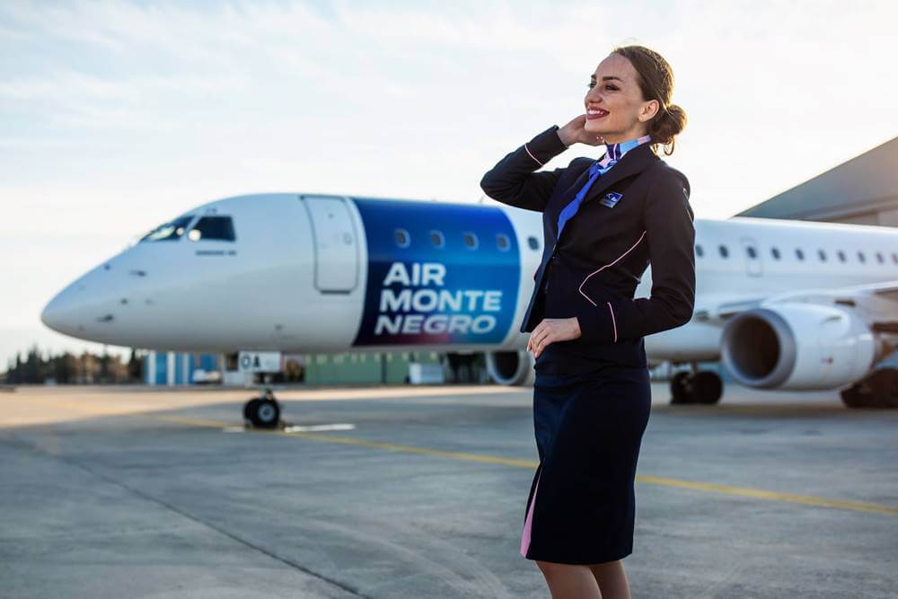 Air Montenegro flight attendant pose