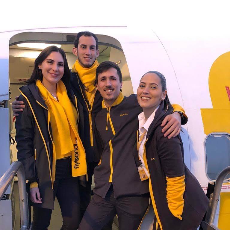 Flybondi male and female flight attendants door area