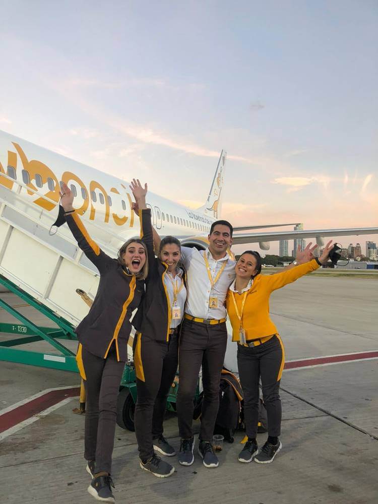 Flybondi male and female flight attendants tarmac