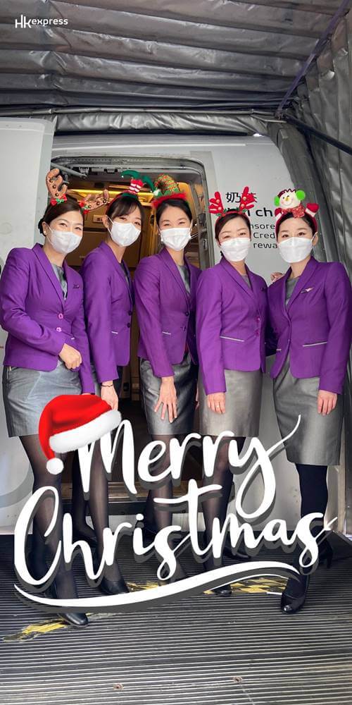 HK Express female flight attendants happy holidays