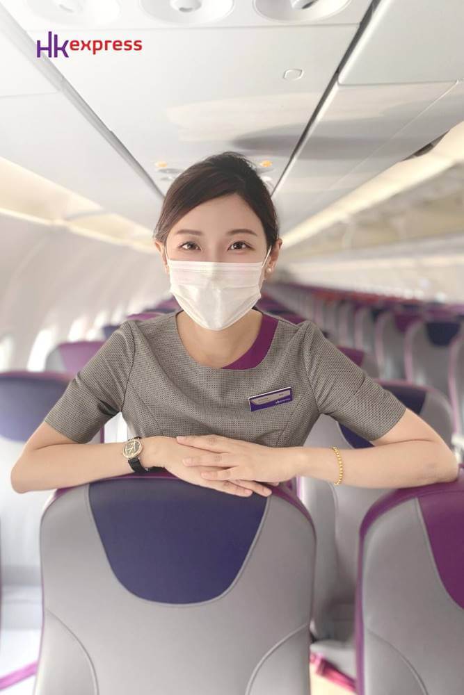 HK Express flight attendant boarding