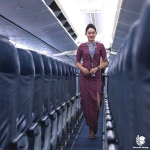 Lion Air female flight attendant aisle
