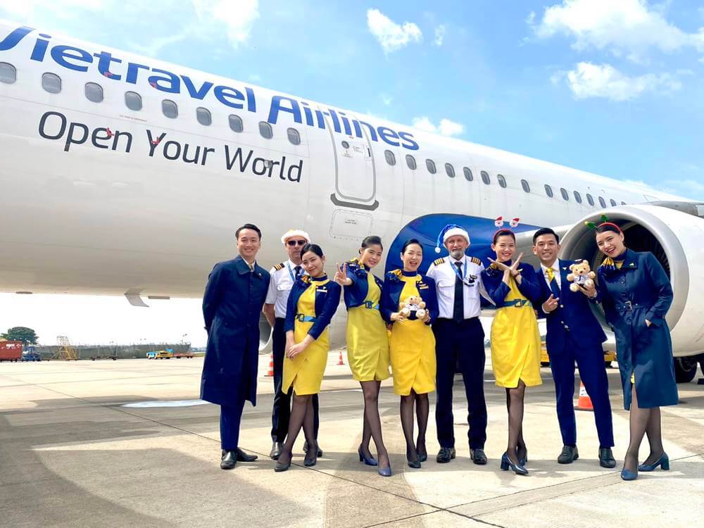 Vietravel Airlines male and female flight attendants tarmac