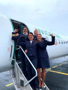 Wideroe flight attendants and pilots steps