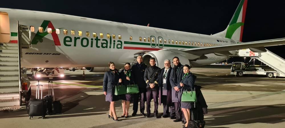 Aeroitalia flight attendants and pilots tarmac