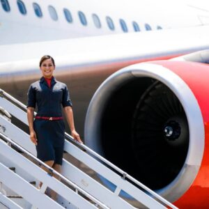 Avior Airlines flight attendant near engine