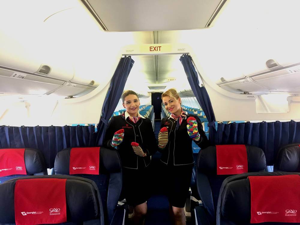 Georgia Airways flight attendants colorful socks