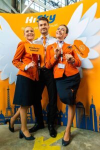 HiSky flight attendants and pilots pose for event