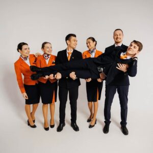 HiSky flight attendants pose happy