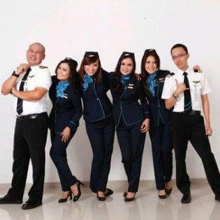 NAM Air flight attendants and pilots group photo