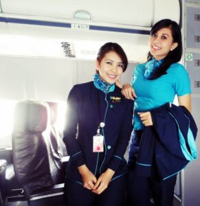 NAM Air flight attendants smile