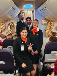 SmartLynx male and female flight attendants hny