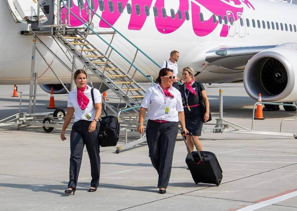 Swoop Airlines flight attendants disembarking