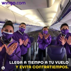 Wingo female flight attendants boarding